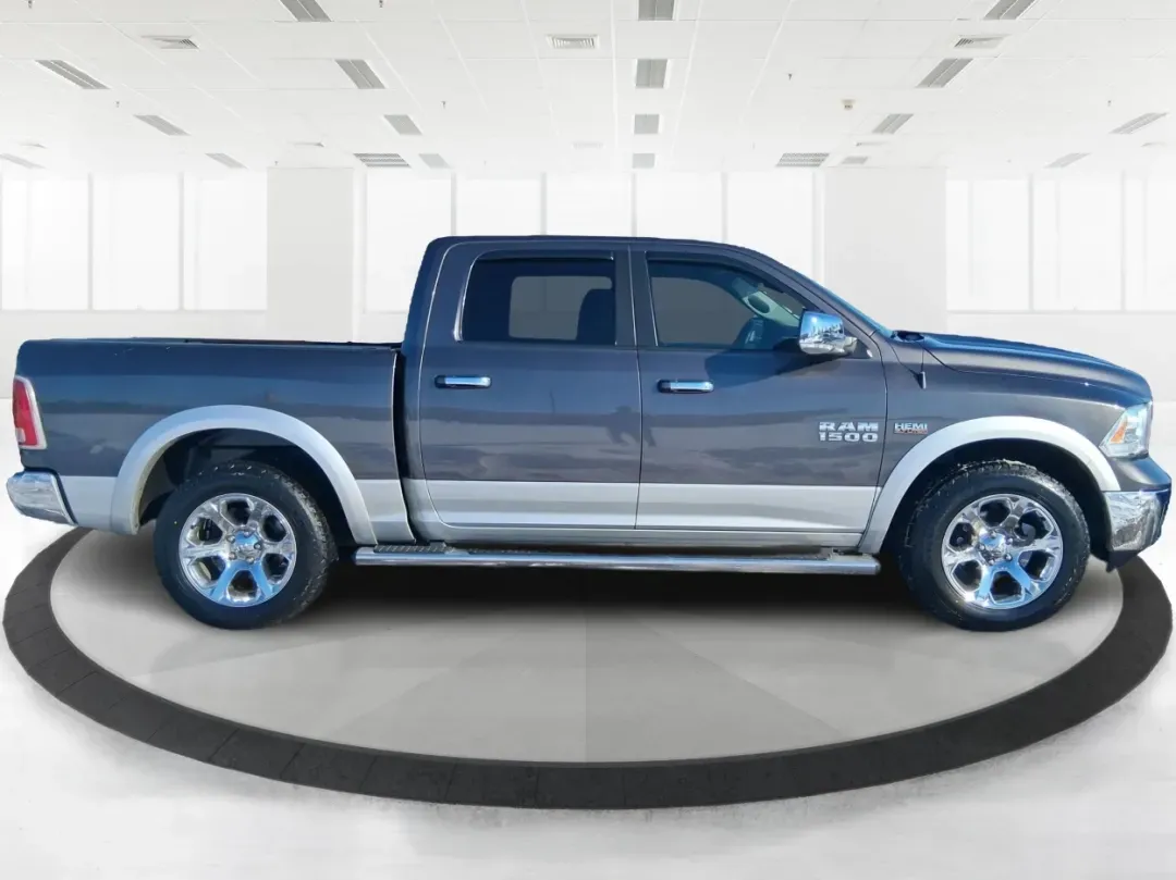 2016 Ram 1500 Laramie (1C6RR7NT1GS) with an 5.7L V8 OHV 16V engine, 6A transmission, located at 1099 N County Rd 25A , Troy, OH, 45373, (937) 908-9800, 40.057079, -84.212883 - Built for Ohio backroads, weekend lake runs, and the kind of workday that doesn't stop when the weather turns, this 2016 Ram 1500 Laramie Crew Cab 4WD is the truck that fits real life in Troy. Whether you're towing a trailer out toward the Miami County Fairgrounds, hauling gear for a Saturday at Tre - Photo#1
