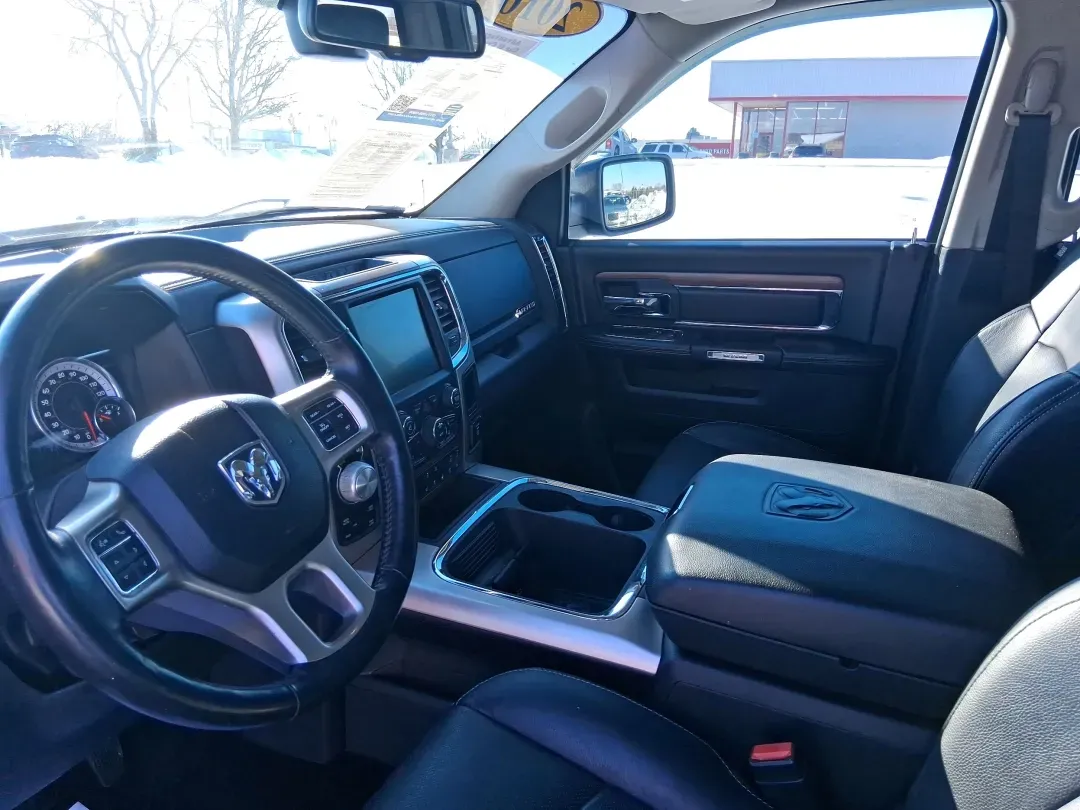 2016 Ram 1500 Laramie (1C6RR7NT1GS) with an 5.7L V8 OHV 16V engine, 6A transmission, located at 1099 N County Rd 25A , Troy, OH, 45373, (937) 908-9800, 40.057079, -84.212883 - Built for Ohio backroads, weekend lake runs, and the kind of workday that doesn't stop when the weather turns, this 2016 Ram 1500 Laramie Crew Cab 4WD is the truck that fits real life in Troy. Whether you're towing a trailer out toward the Miami County Fairgrounds, hauling gear for a Saturday at Tre - Photo#9