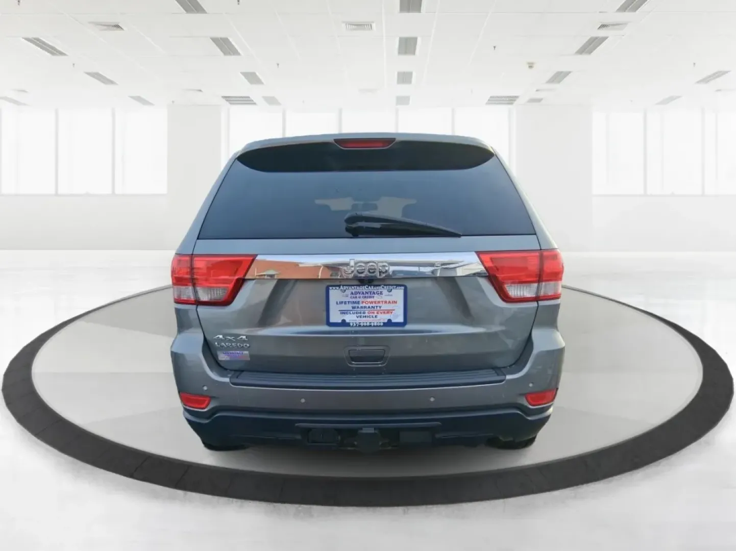 2012 Jeep Grand Cherokee Laredo (1C4RJFAG1CC) with an Other engine, located at 1099 N County Rd 25A , Troy, OH, 45373, (937) 908-9800, 40.057079, -84.212883 - Picture your next weekend escape: loading up the family, pointing the hood toward John A. Wannemacher Nature Reserve, and cruising I75 with confidence no matter what Ohio weather throws your way. This 2012 Jeep Grand Cherokee Laredo is built for real life in Troy-school runs, long commutes to Dayton - Photo#3