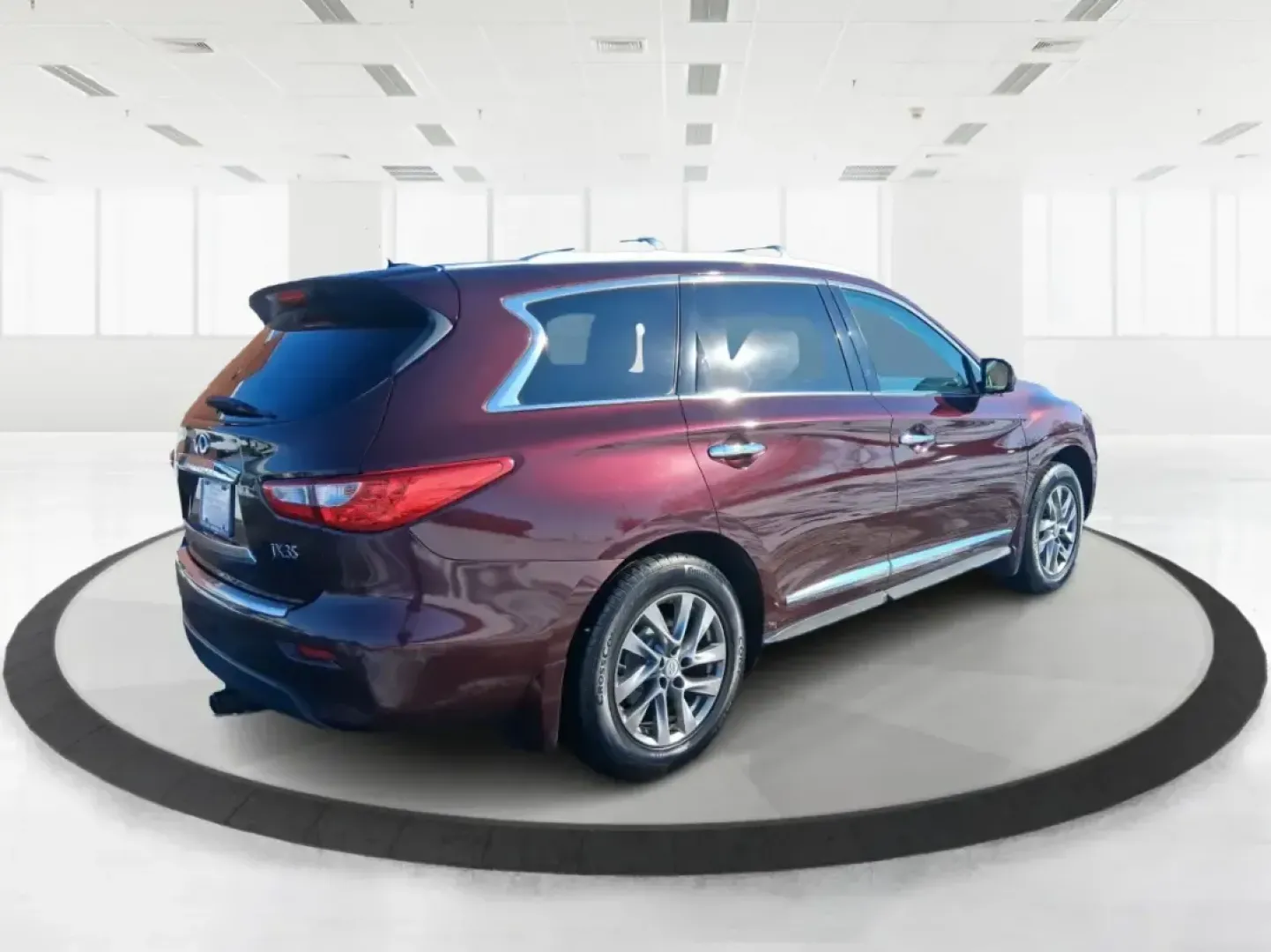 2013 Infiniti JX35 Base (5N1AL0MM9DC) with an 3.5L V6 DOHC 24V engine, Continuously Variable Transmission transmission, located at 1184 Kauffman Ave, Fairborn, OH, 45324, (937) 908-9800, 39.807072, -84.030914 - Need a comfortable, upscale SUV that can handle school drop-offs, I70 commutes, and weekend getaways without blowing the budget? This 2013 INFINITI JX35 Base in rich maroon delivers three-row versatility, premium comfort, and confidence-building safety features-an ideal fit for growing families, bus - Photo#1