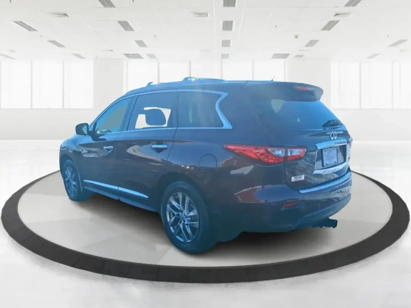 2013 Infiniti JX35 Base (5N1AL0MM9DC) with an 3.5L V6 DOHC 24V engine, Continuously Variable Transmission transmission, located at 1184 Kauffman Ave, Fairborn, OH, 45324, (937) 908-9800, 39.807072, -84.030914 - Need a comfortable, upscale SUV that can handle school drop-offs, I70 commutes, and weekend getaways without blowing the budget? This 2013 INFINITI JX35 Base in rich maroon delivers three-row versatility, premium comfort, and confidence-building safety features-an ideal fit for growing families, bus - Photo#2