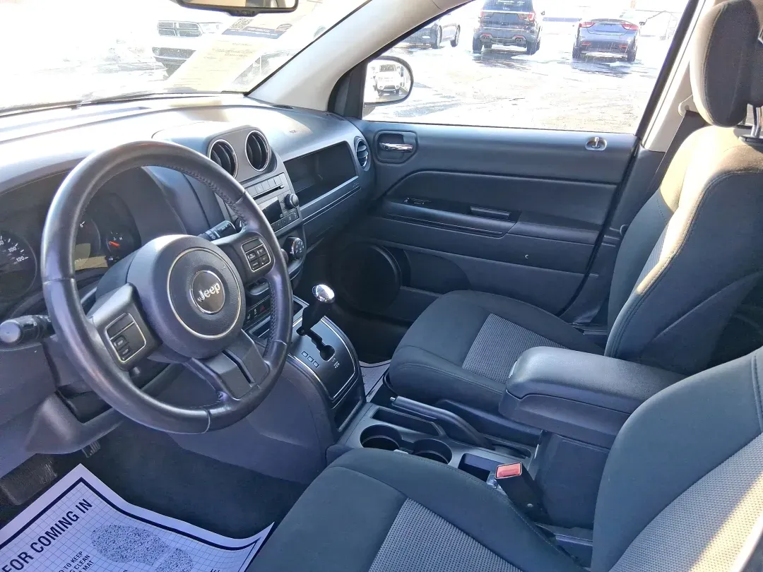 2012 Jeep Compass Latitude (1C4NJDEB4CD) with an 2.4L I-4 DOHC engine, Continuously Variable Transmission transmission, located at 8750 N County Rd 25A, Piqua, OH, 45356, (937) 908-9800, 40.164391, -84.232513 - Need a do-it-all SUV that fits real life in West Central Ohio-school drop-offs, long commutes up I75, and spontaneous weekend escapes to the trails around Johnston Farm and Indian Agency? This 2012 Jeep Compass Latitude 4WD in Bright White Clearcoat is built for that everyday adventure lifestyle, - Photo#8