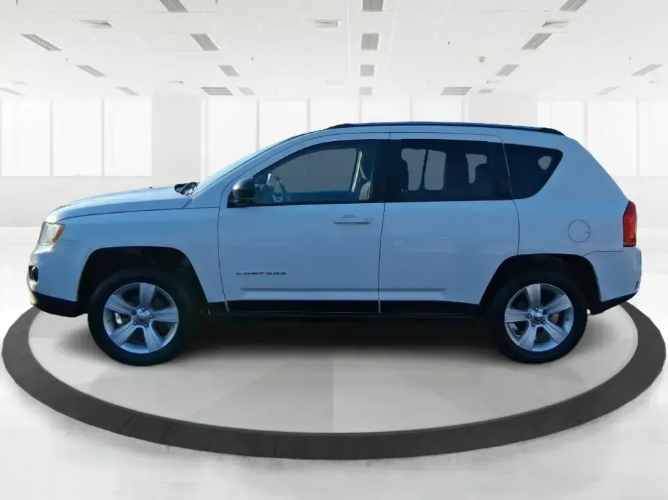 2012 Jeep Compass Latitude (1C4NJDEB4CD) with an 2.4L I-4 DOHC engine, Continuously Variable Transmission transmission, located at 4508 South Dixie Dr, Moraine, OH, 45439, (937) 908-9800, 39.689976, -84.218452 - Need a do-it-all SUV that fits real life in West Central Ohio-school drop-offs, long commutes up I75, and spontaneous weekend escapes to the trails around Johnston Farm and Indian Agency? This 2012 Jeep Compass Latitude 4WD in Bright White Clearcoat is built for that everyday adventure lifestyle, - Photo#5