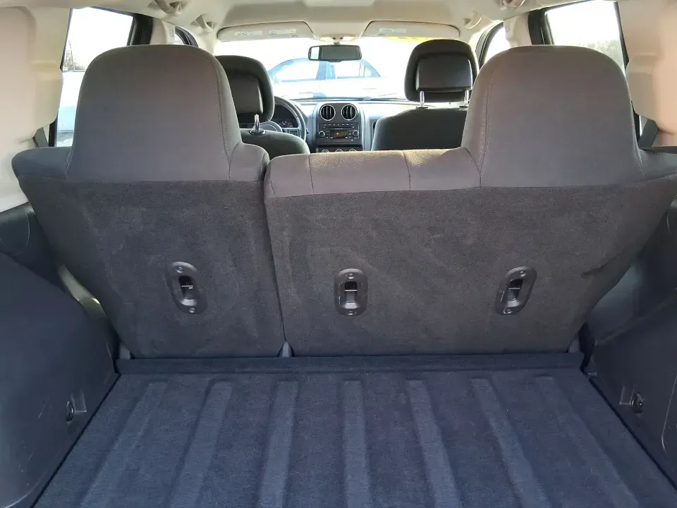 2012 Jeep Compass Latitude (1C4NJDEB4CD) with an 2.4L I-4 DOHC engine, Continuously Variable Transmission transmission, located at 4508 South Dixie Dr, Moraine, OH, 45439, (937) 908-9800, 39.689976, -84.218452 - Need a do-it-all SUV that fits real life in West Central Ohio-school drop-offs, long commutes up I75, and spontaneous weekend escapes to the trails around Johnston Farm and Indian Agency? This 2012 Jeep Compass Latitude 4WD in Bright White Clearcoat is built for that everyday adventure lifestyle, - Photo#11