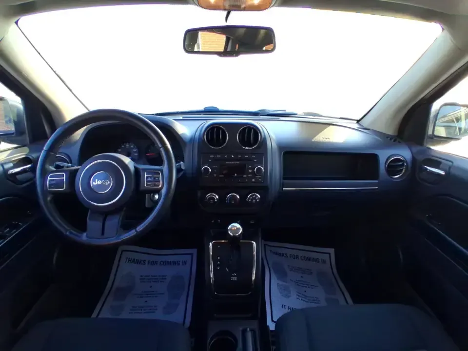 2012 Jeep Compass Latitude (1C4NJDEB4CD) with an 2.4L I-4 DOHC engine, Continuously Variable Transmission transmission, located at 4508 South Dixie Dr, Moraine, OH, 45439, (937) 908-9800, 39.689976, -84.218452 - Need a do-it-all SUV that fits real life in West Central Ohio-school drop-offs, long commutes up I75, and spontaneous weekend escapes to the trails around Johnston Farm and Indian Agency? This 2012 Jeep Compass Latitude 4WD in Bright White Clearcoat is built for that everyday adventure lifestyle, - Photo#18