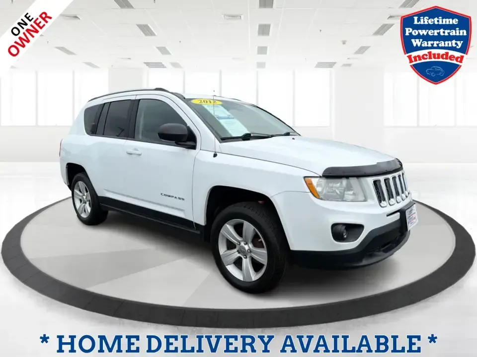 2012 Jeep Compass Latitude (1C4NJDEB4CD) with an 2.4L I-4 DOHC engine, Continuously Variable Transmission transmission, located at 1184 Kauffman Ave, Fairborn, OH, 45324, (937) 908-9800, 39.807072, -84.030914 - Need a do-it-all SUV that fits real life in West Central Ohio-school drop-offs, long commutes up I75, and spontaneous weekend escapes to the trails around Johnston Farm and Indian Agency? This 2012 Jeep Compass Latitude 4WD in Bright White Clearcoat is built for that everyday adventure lifestyle, - Photo#0