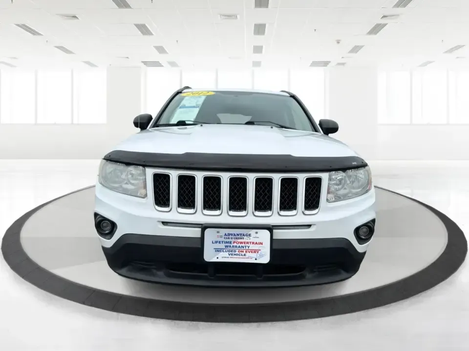2012 Jeep Compass Latitude (1C4NJDEB4CD) with an 2.4L I-4 DOHC engine, Continuously Variable Transmission transmission, located at 1184 Kauffman Ave, Fairborn, OH, 45324, (937) 908-9800, 39.807072, -84.030914 - Need a do-it-all SUV that fits real life in West Central Ohio-school drop-offs, long commutes up I75, and spontaneous weekend escapes to the trails around Johnston Farm and Indian Agency? This 2012 Jeep Compass Latitude 4WD in Bright White Clearcoat is built for that everyday adventure lifestyle, - Photo#7