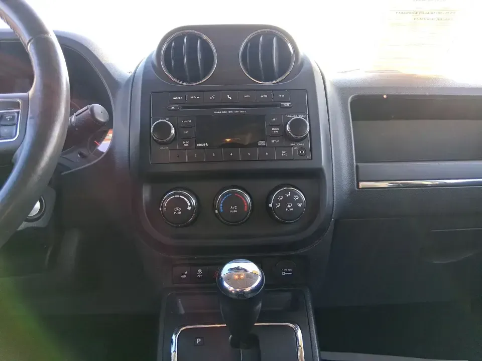 2012 Jeep Compass Latitude (1C4NJDEB4CD) with an 2.4L I-4 DOHC engine, Continuously Variable Transmission transmission, located at 1184 Kauffman Ave, Fairborn, OH, 45324, (937) 908-9800, 39.807072, -84.030914 - Need a do-it-all SUV that fits real life in West Central Ohio-school drop-offs, long commutes up I75, and spontaneous weekend escapes to the trails around Johnston Farm and Indian Agency? This 2012 Jeep Compass Latitude 4WD in Bright White Clearcoat is built for that everyday adventure lifestyle, - Photo#13
