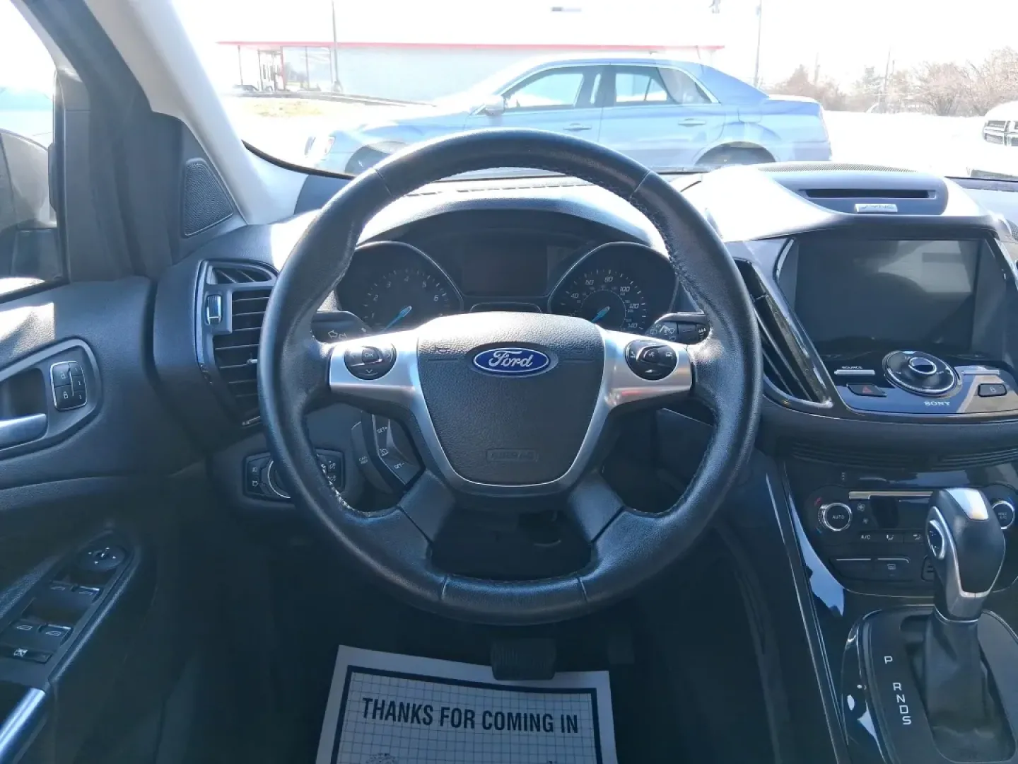 2016 Ford Escape Titanium (1FMCU9J94GU) with an 2.0L L4 DOHC 16V engine, 6-Speed Automatic transmission, located at 1951 S Dayton Lakeview Rd., New Carlisle, OH, 45344, (937) 908-9800, 39.890999, -84.050255 - Picture your next Ohio weekend: a quick grocery run through New Carlisle, a comfortable commute toward Dayton, and then a spontaneous road trip out I70 with the family-without worrying about weather, cargo space, or comfort. This 2016 Ford Escape Titanium in sleek Magnetic is the kind of compact SUV - Photo#16