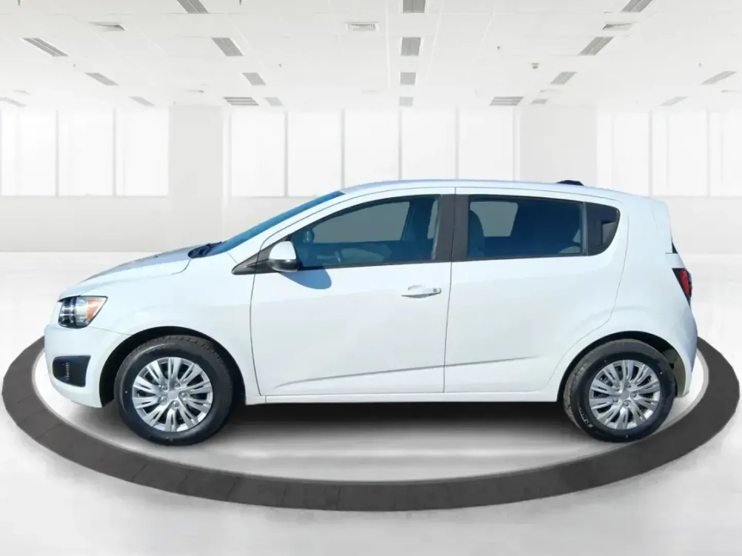 2016 Chevrolet Sonic LS Auto (1G1JA6SH4G4) with an 1.8L L4 DOHC 24V engine, 6A transmission, located at 1230 East Main St, Xenia, OH, 45385, (937) 908-9800, 39.688026, -83.910172 - Need a smart, easy-to-park commuter that can also handle grocery runs, campus life, and weekend getaways without draining your budget? This 2016 Chevrolet Sonic LS Auto Hatchback is built for real-life Fairborn living-zipping down I675 for work, cruising over to Wright-Patterson Air Force Base, or h - Photo#4