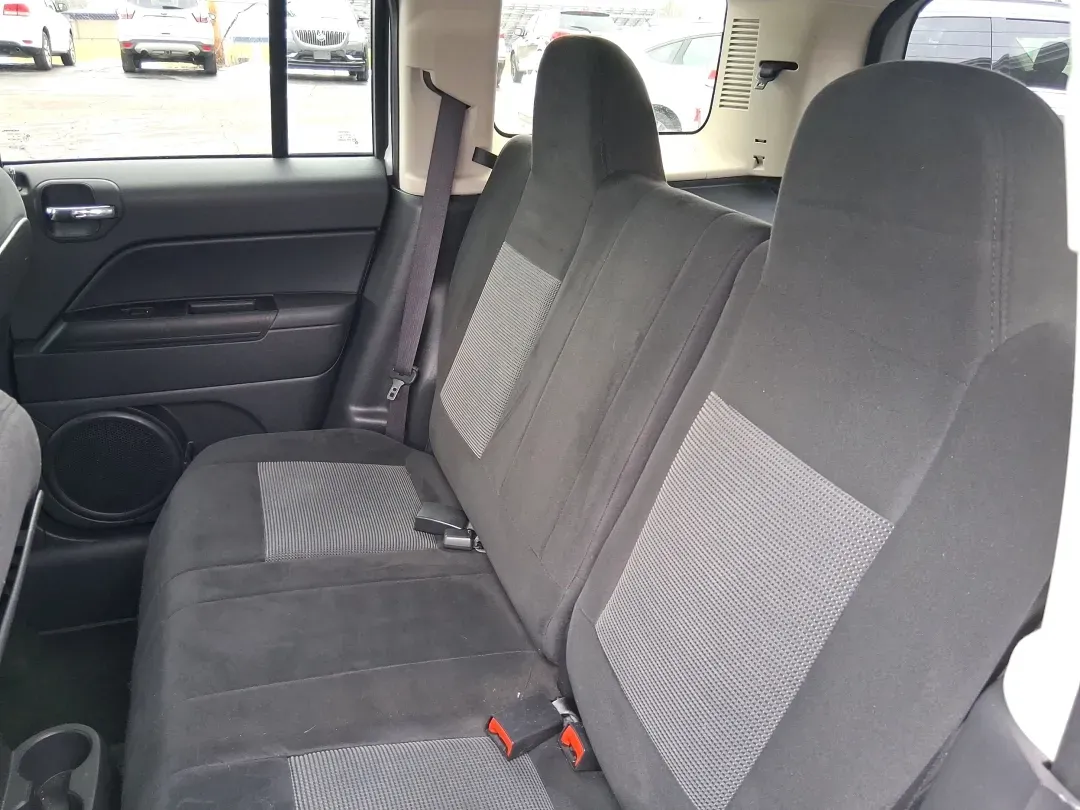 2016 Jeep Patriot Latitude (1C4NJPFA8GD) with an 2.0L L4 DOHC 16V engine, located at 1230 East Main St, Xenia, OH, 45385, (937) 908-9800, 39.688026, -83.910172 - Picture your next weekend escape: loading up the gear, pointing the hood toward John Bryan State Park or a day trip to Dayton, and enjoying the confident, go-anywhere feel that makes a Jeep a Jeep. This **2016 Jeep Patriot Latitude** is a smart fit for commuters, first-time buyers, and budget-consci - Photo#10