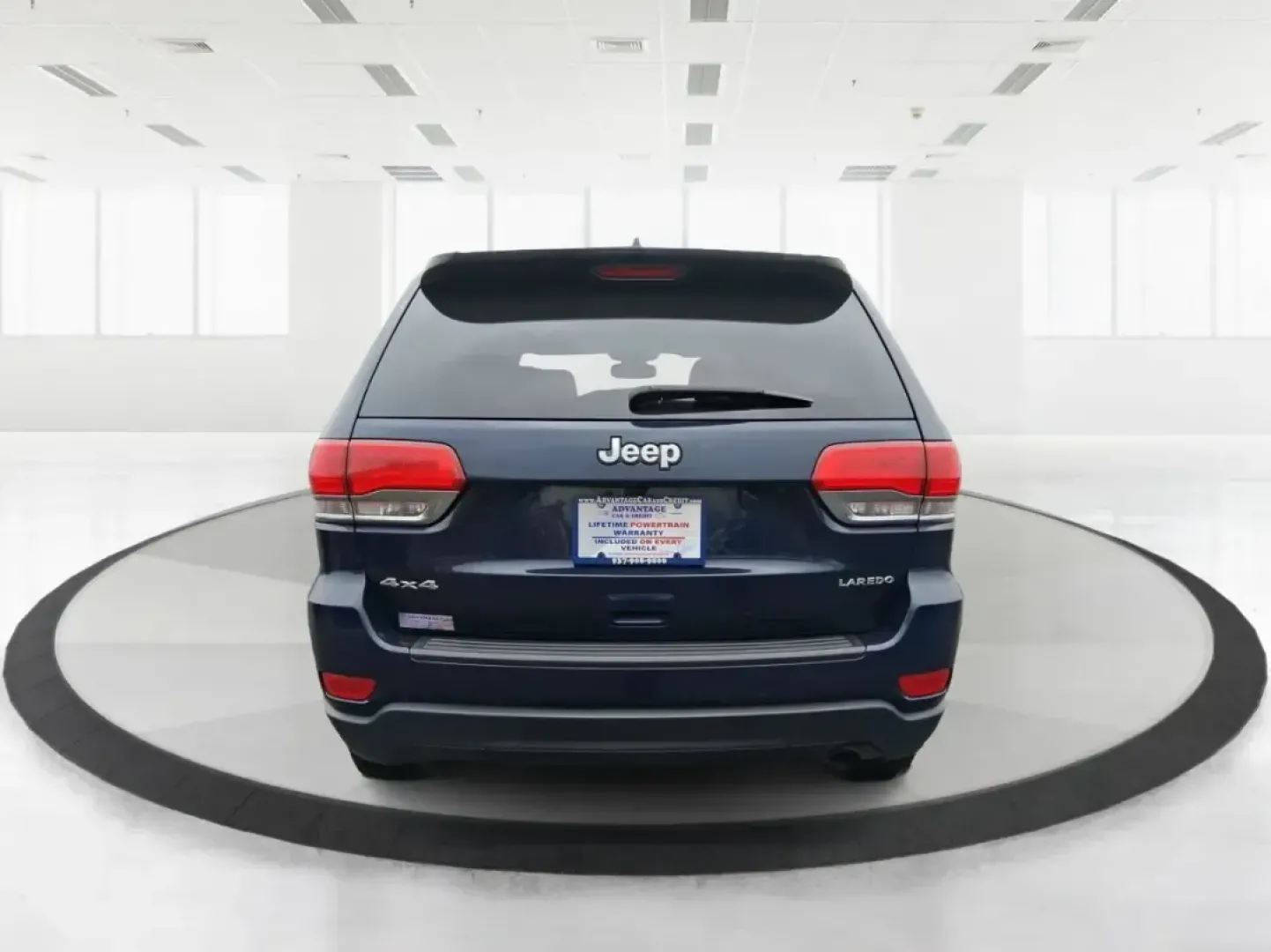 2015 Jeep Grand Cherokee Laredo (1C4RJFAG1FC) with an 3.6L V-6 DOHC engine, 8-Speed Automatic transmission, located at 1951 S Dayton Lakeview Rd., New Carlisle, OH, 45344, (937) 908-9800, 39.890999, -84.050255 - Picture a weekend that starts with a smooth commute through Clark County and ends with a spontaneous road trip-camp gear in the back, friends in the second row, and confidence when the weather turns. This 2015 Jeep Grand Cherokee Laredo is built for real life in Ohio: school runs, long drives down I - Photo#3