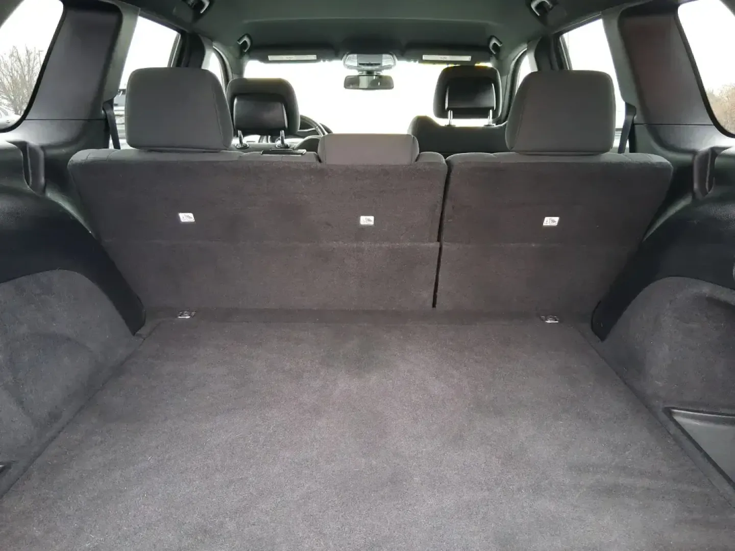 2015 Jeep Grand Cherokee Laredo (1C4RJFAG1FC) with an 3.6L V-6 DOHC engine, 8-Speed Automatic transmission, located at 1951 S Dayton Lakeview Rd., New Carlisle, OH, 45344, (937) 908-9800, 39.890999, -84.050255 - Picture a weekend that starts with a smooth commute through Clark County and ends with a spontaneous road trip-camp gear in the back, friends in the second row, and confidence when the weather turns. This 2015 Jeep Grand Cherokee Laredo is built for real life in Ohio: school runs, long drives down I - Photo#12