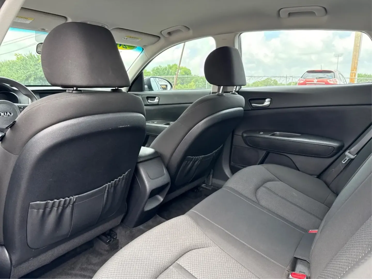 2018 Kia Optima LX (KNAGT4L33J5) with an Theta II 2.4L I-4 gasoline direct injection engine, located at 1099 N County Rd 25A , Troy, OH, 45373, (937) 908-9800, 40.057079, -84.212883 - **Experience the Perfect Blend of Style and Comfort with the 2018 Kia Optima LX at Advantage Car and Credit!**<br /> <br /> Are you searching for a reliable sedan that fits seamlessly into your busy lifestyle? Look no further! The 2018 Kia Optima LX is not just a means of transportation; it's your p - Photo#10