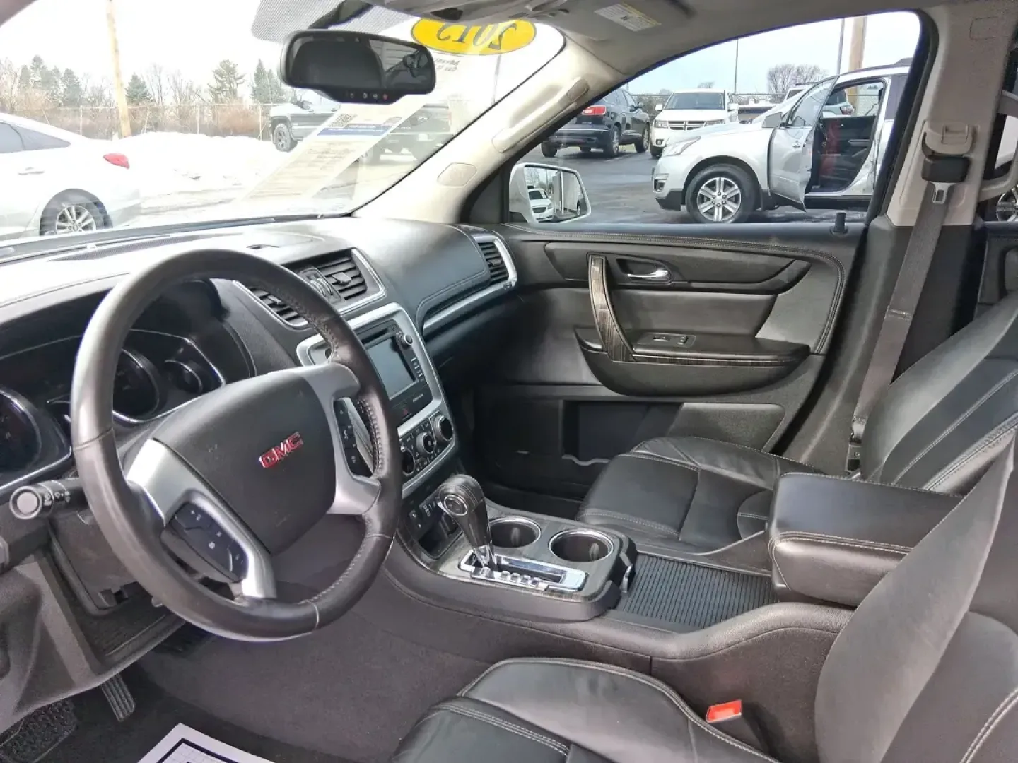 2015 GMC Acadia SLT-1 (1GKKRRKDXFJ) with an 3.6L V-6 gasoline direct injection engine, 6-Speed Automatic transmission, located at 4508 South Dixie Dr, Moraine, OH, 45439, (937) 908-9800, 39.689976, -84.218452 - Need one SUV that can handle school drop-offs, a long commute up I75, and a packed weekend at Carillon Historical Park or a day trip to Caesar Creek? This 2015 GMC Acadia SLT-1 is built for real life in Moraine-roomy, comfortable, and ready for the daily hustle while still feeling upscale for road-t - Photo#9