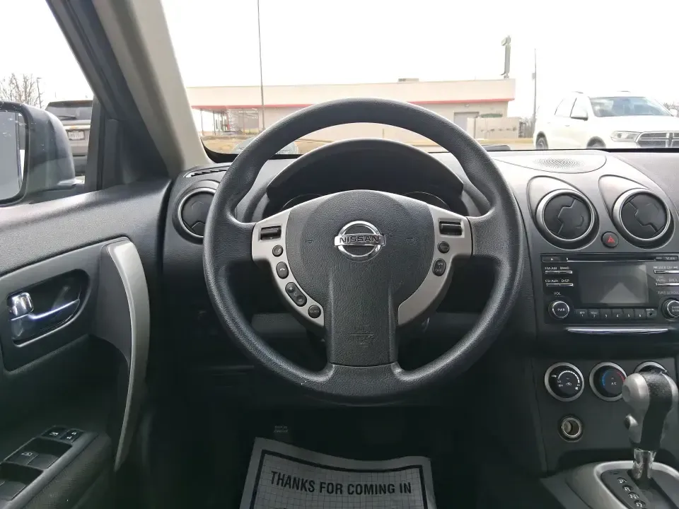 2013 Nissan Rogue S (JN8AS5MV5DW) with an 2.5L I-4 DOHC engine, Continuously Variable Transmission transmission, located at 8750 N County Rd 25A, Piqua, OH, 45356, (937) 908-9800, 40.164391, -84.232513 - Ready for a practical SUV that fits real life in the Miami Valley-school drop-offs, I-75 commutes, grocery runs, and spontaneous weekend getaways to Carillon Historical Park or a stroll around The Greene? This **2013 Nissan Rogue S** is the kind of compact SUV that makes everyday driving easier, wit - Photo#16
