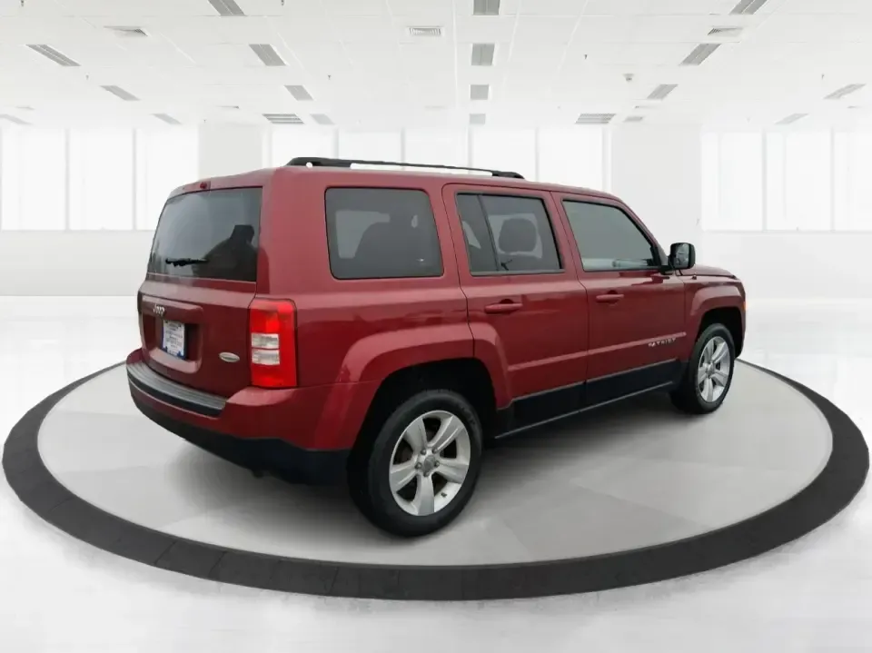 2012 Jeep Patriot Latitude (1C4NJPFB0CD) with an 2.4L L4 DOHC 16V engine, located at 1099 N County Rd 25A , Troy, OH, 45373, (937) 908-9800, 40.057079, -84.212883 - Picture your next weekend: a quick run up I-75 for a family visit, a scenic drive past the Miami River, then an easy loop back through downtown Troy for dinner-without worrying about whether your SUV can keep up with daily life. This 2012 Jeep Patriot Latitude is built for practical adventures and e - Photo#2
