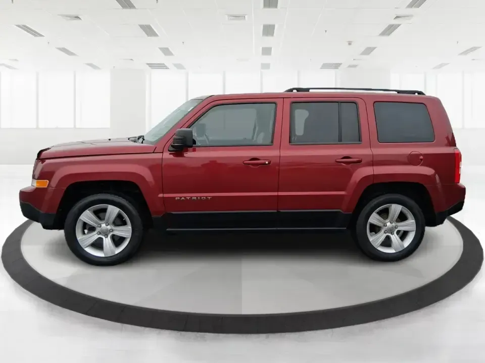 2012 Jeep Patriot Latitude (1C4NJPFB0CD) with an 2.4L L4 DOHC 16V engine, located at 1099 N County Rd 25A , Troy, OH, 45373, (937) 908-9800, 40.057079, -84.212883 - Picture your next weekend: a quick run up I-75 for a family visit, a scenic drive past the Miami River, then an easy loop back through downtown Troy for dinner-without worrying about whether your SUV can keep up with daily life. This 2012 Jeep Patriot Latitude is built for practical adventures and e - Photo#5