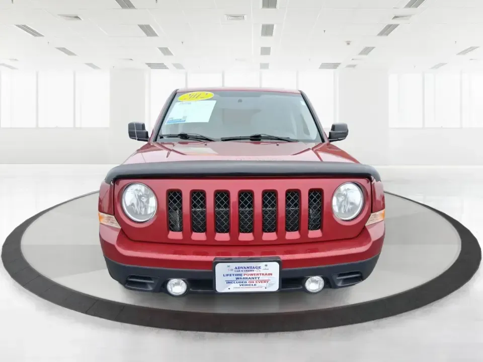 2012 Jeep Patriot Latitude (1C4NJPFB0CD) with an 2.4L L4 DOHC 16V engine, located at 1099 N County Rd 25A , Troy, OH, 45373, (937) 908-9800, 40.057079, -84.212883 - Picture your next weekend: a quick run up I-75 for a family visit, a scenic drive past the Miami River, then an easy loop back through downtown Troy for dinner-without worrying about whether your SUV can keep up with daily life. This 2012 Jeep Patriot Latitude is built for practical adventures and e - Photo#7