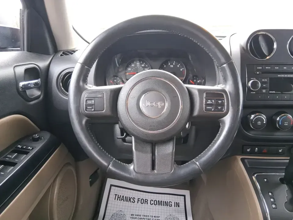 2012 Jeep Patriot Latitude (1C4NJPFB0CD) with an 2.4L L4 DOHC 16V engine, located at 1099 N County Rd 25A , Troy, OH, 45373, (937) 908-9800, 40.057079, -84.212883 - Picture your next weekend: a quick run up I-75 for a family visit, a scenic drive past the Miami River, then an easy loop back through downtown Troy for dinner-without worrying about whether your SUV can keep up with daily life. This 2012 Jeep Patriot Latitude is built for practical adventures and e - Photo#16