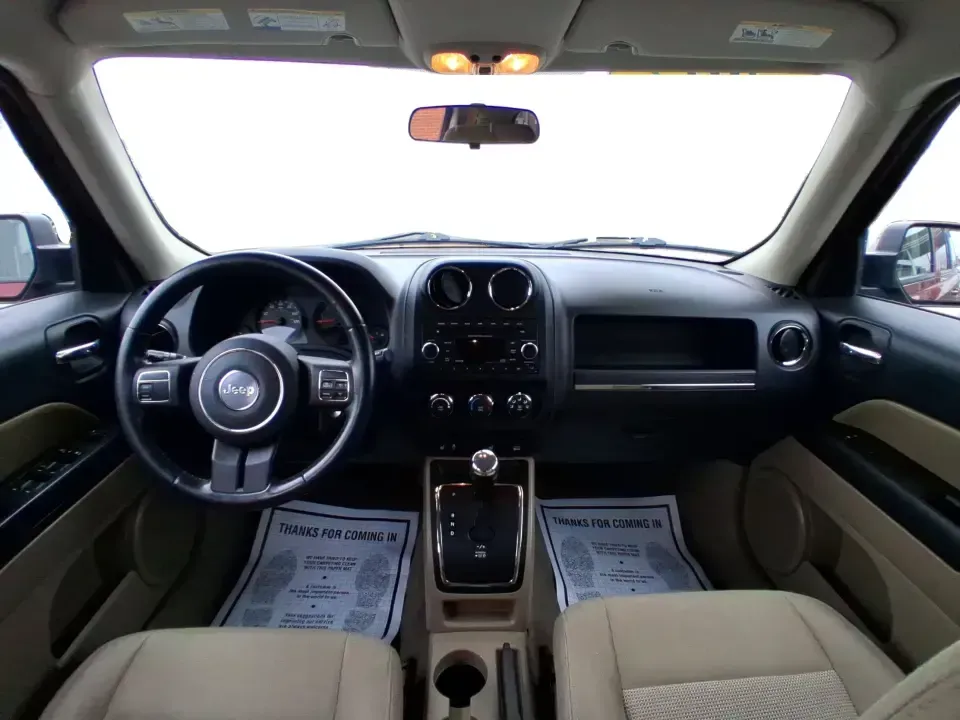 2012 Jeep Patriot Latitude (1C4NJPFB0CD) with an 2.4L L4 DOHC 16V engine, located at 1099 N County Rd 25A , Troy, OH, 45373, (937) 908-9800, 40.057079, -84.212883 - Picture your next weekend: a quick run up I-75 for a family visit, a scenic drive past the Miami River, then an easy loop back through downtown Troy for dinner-without worrying about whether your SUV can keep up with daily life. This 2012 Jeep Patriot Latitude is built for practical adventures and e - Photo#19