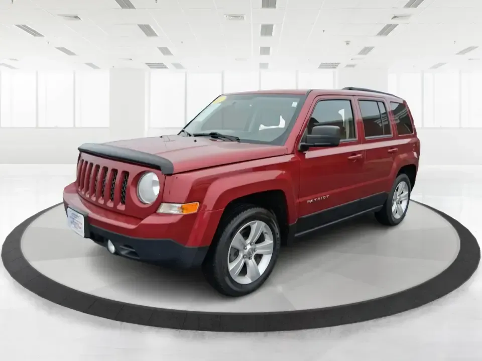 2012 Jeep Patriot Latitude (1C4NJPFB0CD) with an 2.4L L4 DOHC 16V engine, located at 1230 East Main St, Xenia, OH, 45385, (937) 908-9800, 39.688026, -83.910172 - Picture your next weekend: a quick run up I-75 for a family visit, a scenic drive past the Miami River, then an easy loop back through downtown Troy for dinner-without worrying about whether your SUV can keep up with daily life. This 2012 Jeep Patriot Latitude is built for practical adventures and e - Photo#8