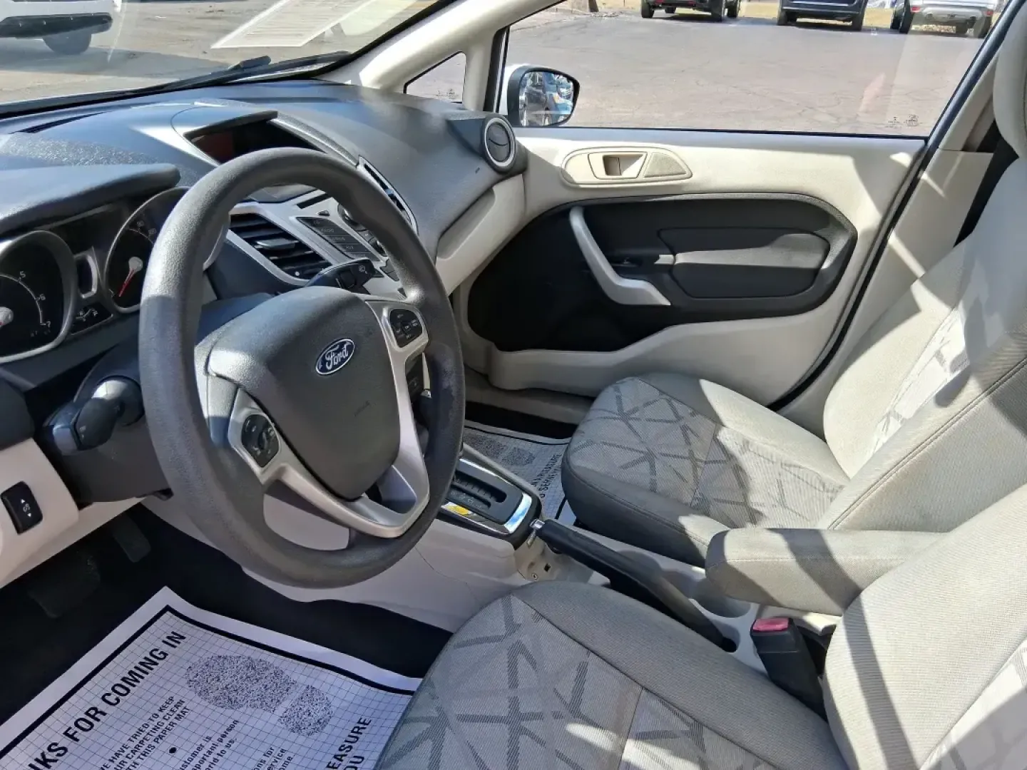 2013 Ford Fiesta SE (3FADP4BJXDM) with an 1.6L I-4 DOHC engine, located at 1951 S Dayton Lakeview Rd., New Carlisle, OH, 45344, (937) 908-9800, 39.890999, -84.050255 - Need a smart, efficient commuter that's easy to park downtown, nimble on I70, and still comfortable for weekend errands or a quick getaway to Springfield or Dayton? This 2013 Ford Fiesta SE Sedan in Oxford White delivers practical daily driving with the kind of budget-friendly ownership that fits re - Photo#9