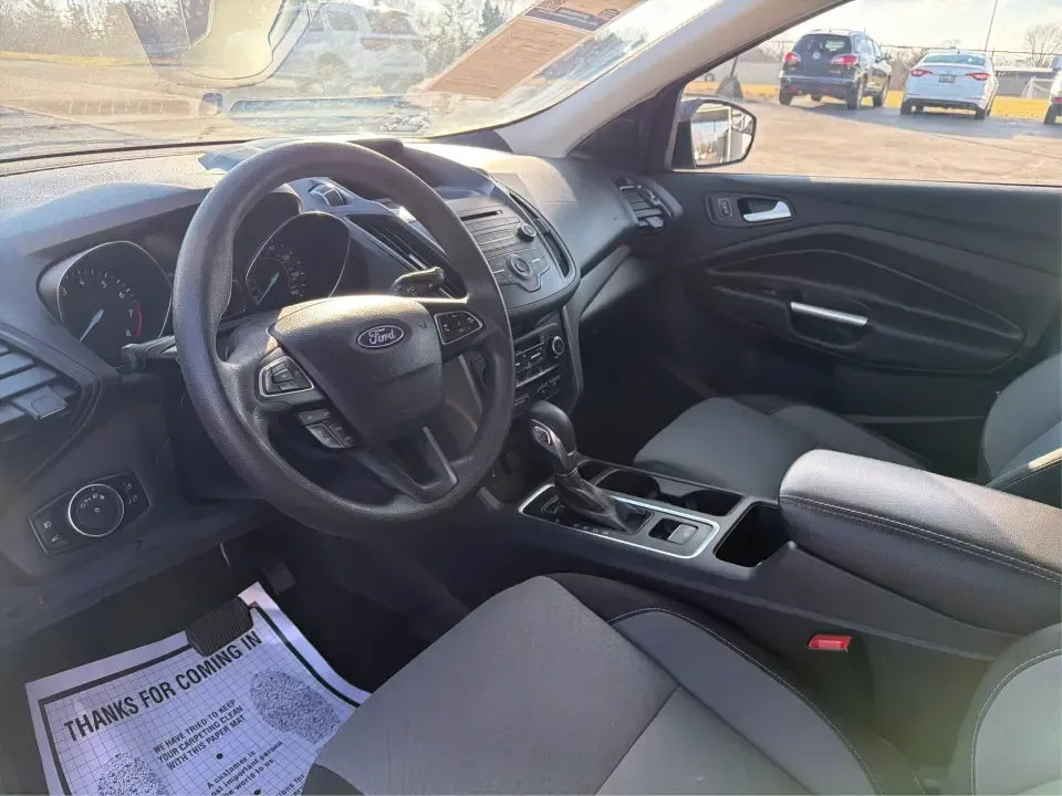 2018 Ford Escape SE (1FMCU9GD4JU) with an 1.5L L4 DOHC 16V engine, 6A transmission, located at 880 E. National Road, Vandalia, OH, 45377, (937) 908-9800, 39.891918, -84.183594 - Picture your next Ohio weekend: loading up the kids for a splash at Splash Xenia, cruising out to John Bryan State Park for a hike, or tackling a snowy morning commute from Beavercreek to downtown Dayton with confidence. This 2018 Ford Escape SE in Blue Metallic is the kind of compact SUV that fits - Photo#9