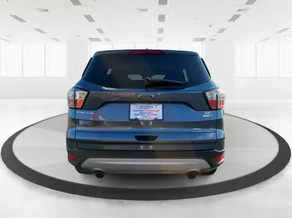 2018 Ford Escape SE 4WD (1FMCU9GD4JU) with an 1.5L L4 DOHC 16V engine, 6A transmission, located at 1951 S Dayton Lakeview Rd., New Carlisle, OH, 45344, (937) 908-9800, 39.890999, -84.050255 - Picture your next Ohio week looking easier: a confident commuter for I-70 runs, a comfortable family hauler for school drop-offs, and a ready-for-any-weather SUV for weekend trips out toward Springfield, Dayton, or a quick getaway to Buck Creek State Park. This 2018 Ford Escape SE 4WD fits that real- Photo#3