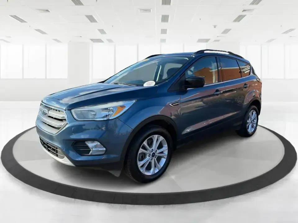 2018 Ford Escape SE 4WD (1FMCU9GD4JU) with an 1.5L L4 DOHC 16V engine, 6A transmission, located at 1951 S Dayton Lakeview Rd., New Carlisle, OH, 45344, (937) 908-9800, 39.890999, -84.050255 - Picture your next Ohio week looking easier: a confident commuter for I-70 runs, a comfortable family hauler for school drop-offs, and a ready-for-any-weather SUV for weekend trips out toward Springfield, Dayton, or a quick getaway to Buck Creek State Park. This 2018 Ford Escape SE 4WD fits that real- Photo#8