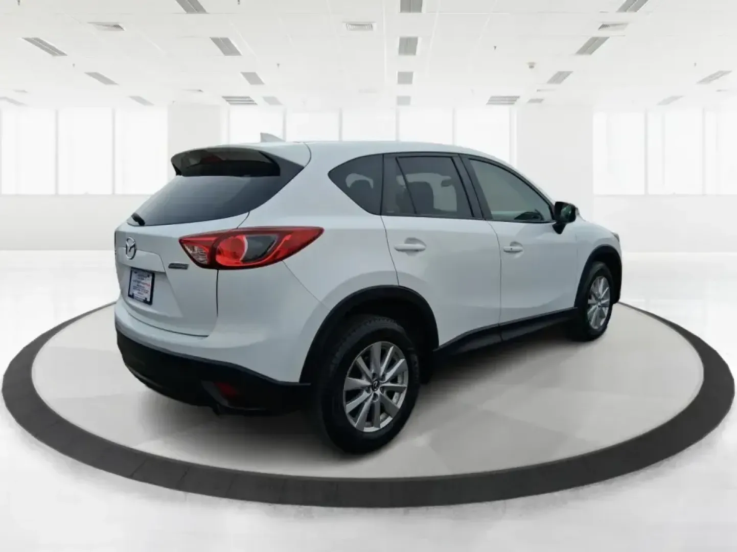 2016 Mazda CX-5 Touring (JM3KE4CY4G0) with an SKYACTIV-G 2.5L I-4 gasoline direct injection engine, 6-Speed Automatic transmission, located at 401 Woodman Dr, Riverside, OH, 45431, (937) 908-9800, 39.760899, -84.123421 - Weekend getaways to John Bryan State Park, everyday commuting down Woodman Dr, or hauling groceries back from The Greene-this 2016 Mazda CX-5 Touring is the kind of SUV that fits real life in Riverside, Ohio. With confident all-weather capability and a smart, comfortable cabin, it's a practical choi - Photo#2