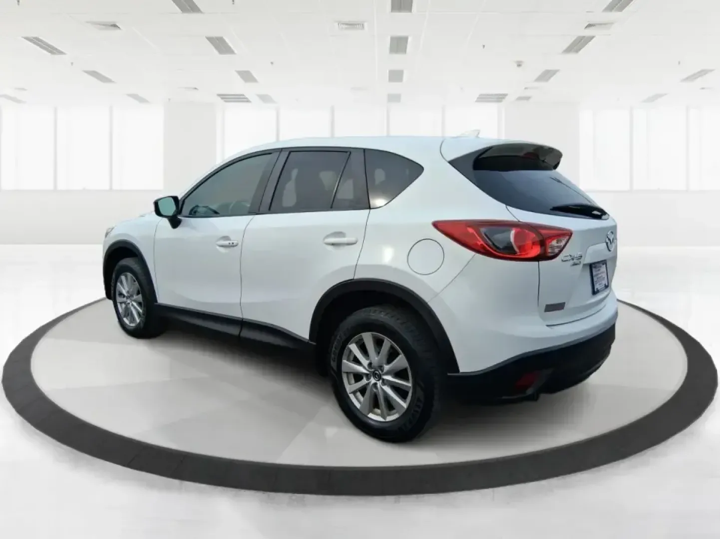 2016 Mazda CX-5 Touring (JM3KE4CY4G0) with an SKYACTIV-G 2.5L I-4 gasoline direct injection engine, 6-Speed Automatic transmission, located at 401 Woodman Dr, Riverside, OH, 45431, (937) 908-9800, 39.760899, -84.123421 - Weekend getaways to John Bryan State Park, everyday commuting down Woodman Dr, or hauling groceries back from The Greene-this 2016 Mazda CX-5 Touring is the kind of SUV that fits real life in Riverside, Ohio. With confident all-weather capability and a smart, comfortable cabin, it's a practical choi - Photo#4