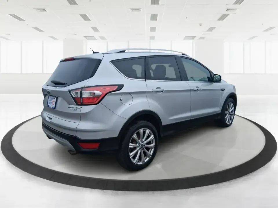 2017 Ford Escape Titanium (1FMCU9J9XHU) with an 2.0L L4 DOHC 16V engine, 6A transmission, located at 4508 South Dixie Dr, Moraine, OH, 45439, (937) 908-9800, 39.689976, -84.218452 - Picture your next Ohio weekend: a comfortable SUV loaded with gear, cruising down I-75 for a quick Dayton outing, then turning toward the MetroParks for a hike-without worrying about winter weather, tight parking lots, or long-drive fatigue. This 2017 Ford Escape Titanium is built for real life in M - Photo#2