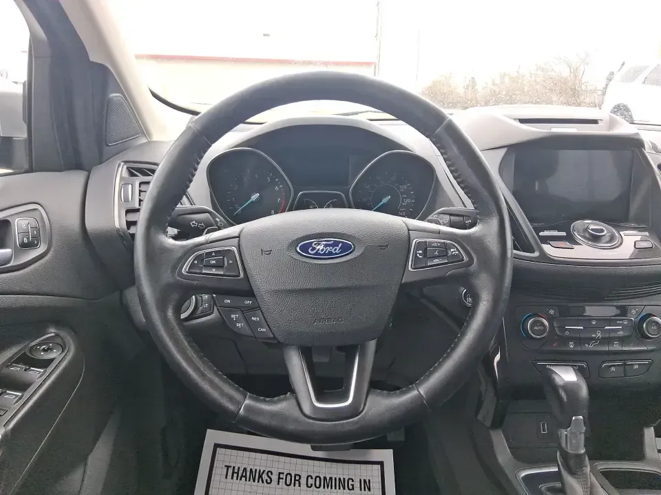 2017 Ford Escape Titanium (1FMCU9J9XHU) with an 2.0L L4 DOHC 16V engine, 6A transmission, located at 4508 South Dixie Dr, Moraine, OH, 45439, (937) 908-9800, 39.689976, -84.218452 - Picture your next Ohio weekend: a comfortable SUV loaded with gear, cruising down I-75 for a quick Dayton outing, then turning toward the MetroParks for a hike-without worrying about winter weather, tight parking lots, or long-drive fatigue. This 2017 Ford Escape Titanium is built for real life in M - Photo#16