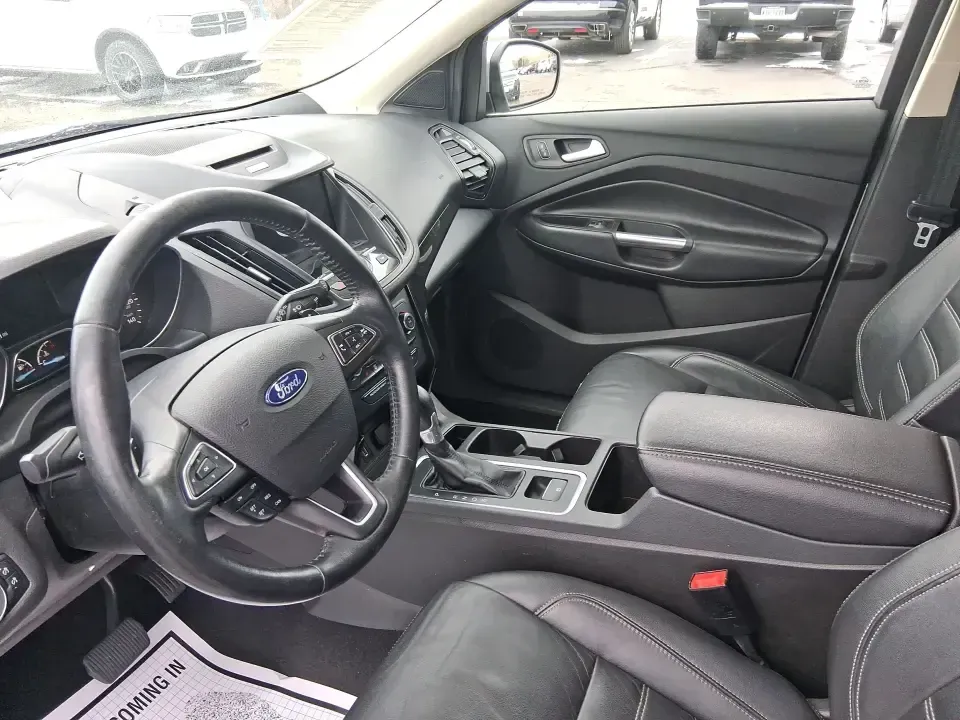 2017 Ford Escape Titanium (1FMCU9J9XHU) with an 2.0L L4 DOHC 16V engine, 6A transmission, located at 401 Woodman Dr, Riverside, OH, 45431, (937) 908-9800, 39.760899, -84.123421 - Picture your next Ohio weekend: a comfortable SUV loaded with gear, cruising down I-75 for a quick Dayton outing, then turning toward the MetroParks for a hike-without worrying about winter weather, tight parking lots, or long-drive fatigue. This 2017 Ford Escape Titanium is built for real life in M - Photo#9