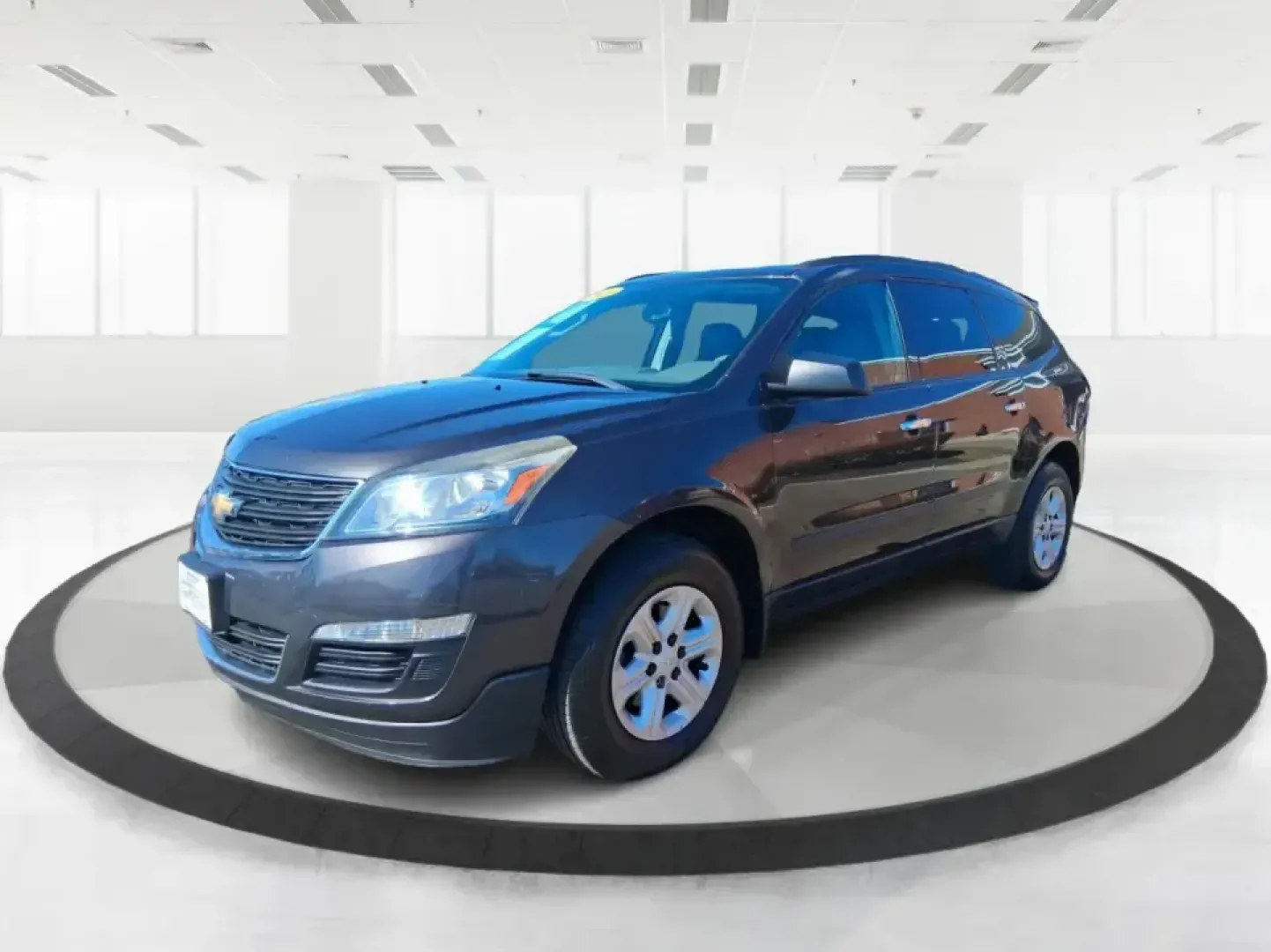 2016 Chevrolet Traverse LS (1GNKRFKDXGJ) with an 3.6L V-6 gasoline direct injection engine, 6A transmission, located at 401 Woodman Dr, Riverside, OH, 45431, (937) 908-9800, 39.760899, -84.123421 - Need one SUV that can handle school drop-offs, long commutes to Dayton, and weekend runs out toward John Bryan State Park without feeling cramped? This 2016 Chevrolet Traverse LS is built for real life-roomy seating for the whole crew, flexible cargo space for strollers or sports gear, and confident - Photo#7